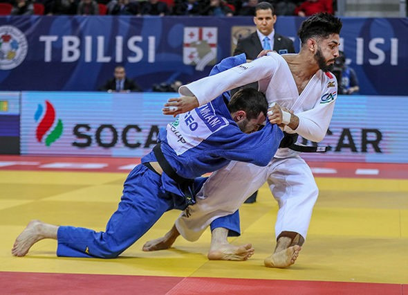 Georgia's Lukhumi Chkhvimiani triumphed at his home IJF Grand Prix for the third consecutive year, defeating France's Walide Khyar in the men's under-60kg final ©IJF