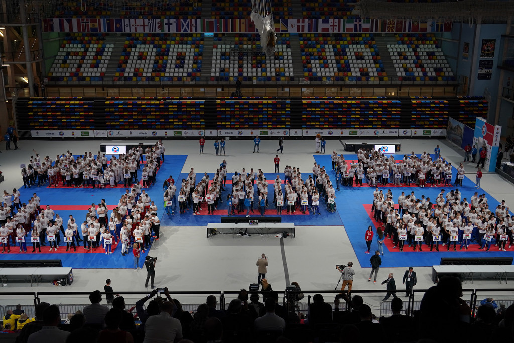 Athletes at the European Karate Championships wore white t-shirts with the phrase "Karate Olympic Sport" during the Opening Ceremony ©WKF