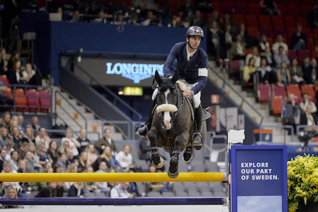 Switzerland’s world number one Steve Guerdat, seeking a third FEI Jumping World Cup final win, took an early lead by winning on day one in Gothenburg on his second choice, Alamo ©FEI