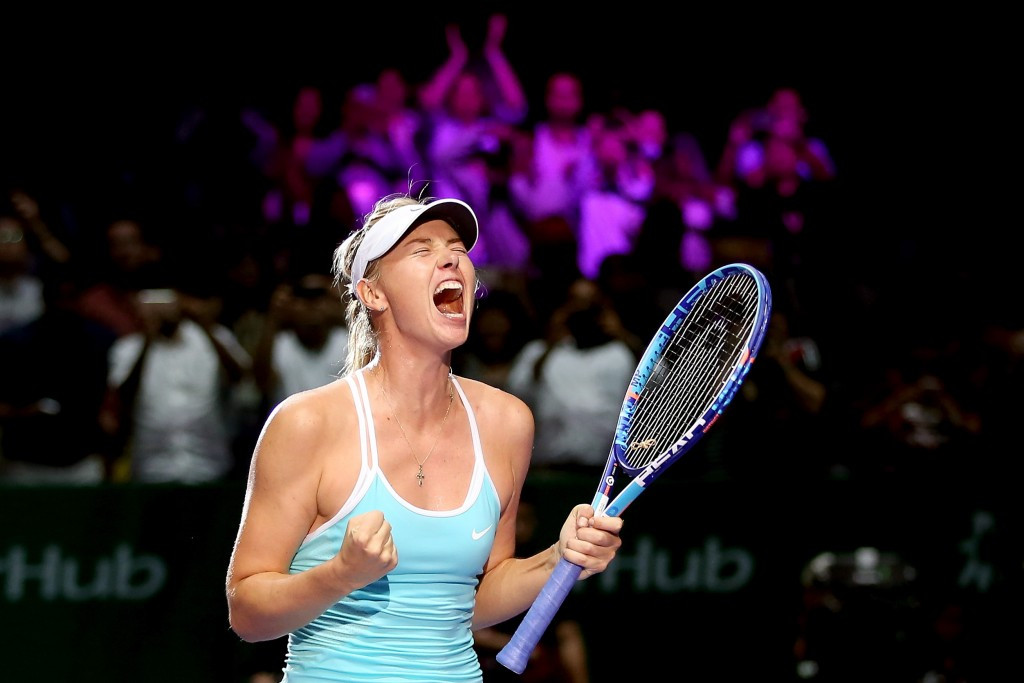 Sharapova on course for last-four spot at WTA Finals after beating Halep in straight sets