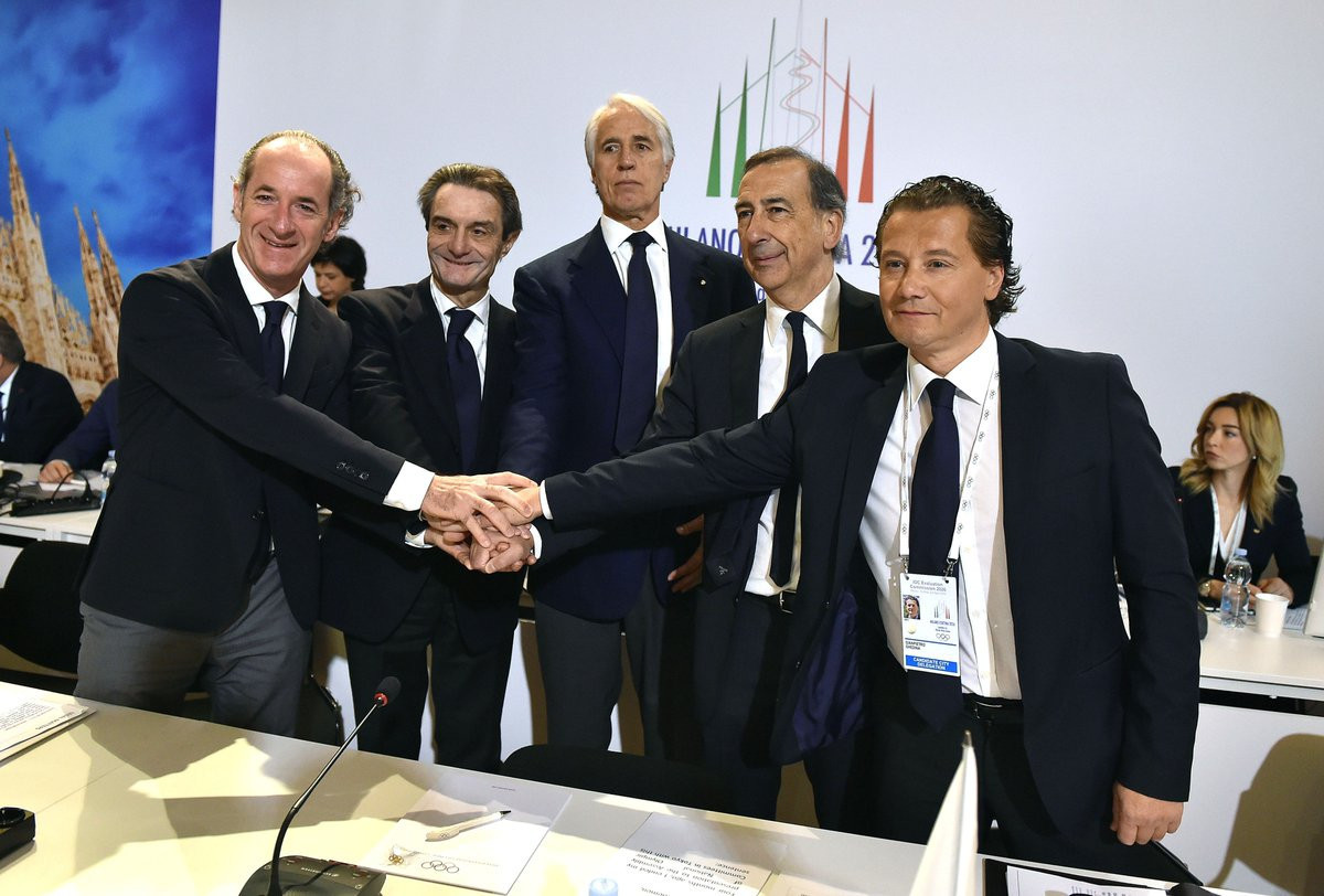 Key stakeholders, including Italian National Olympic Committee President Giovanni Malagò, centre, and Milan Mayor Giuseppe Sala , second right, joined forces to back Milan Cortina 2026 ©Milan Cortina 2026