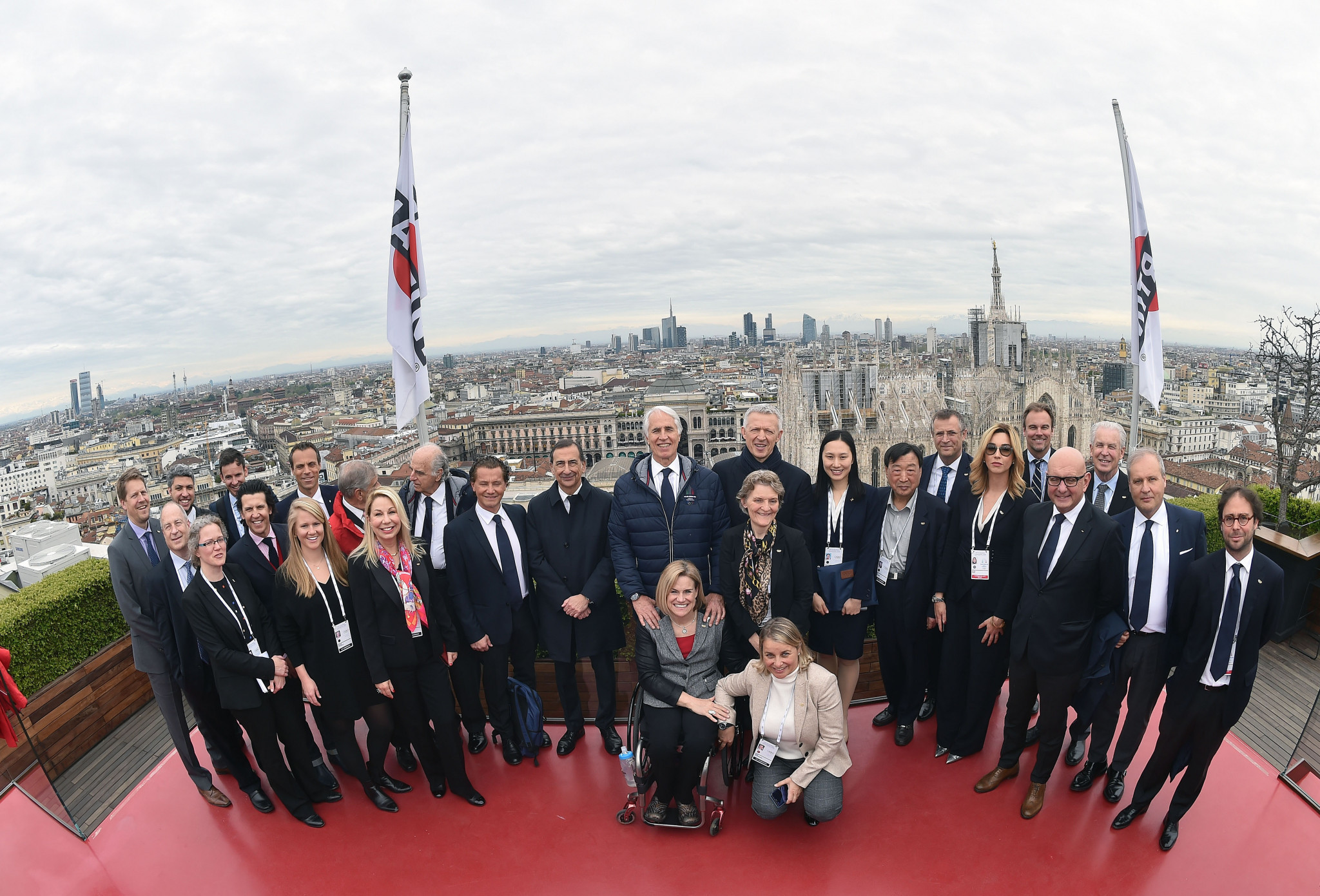 The beauty of Milan was on show as the IOC Evaluation Commission and top Milan Cortina 2026 officials posed for a souvenir photograph ©Milan Cortina 2026