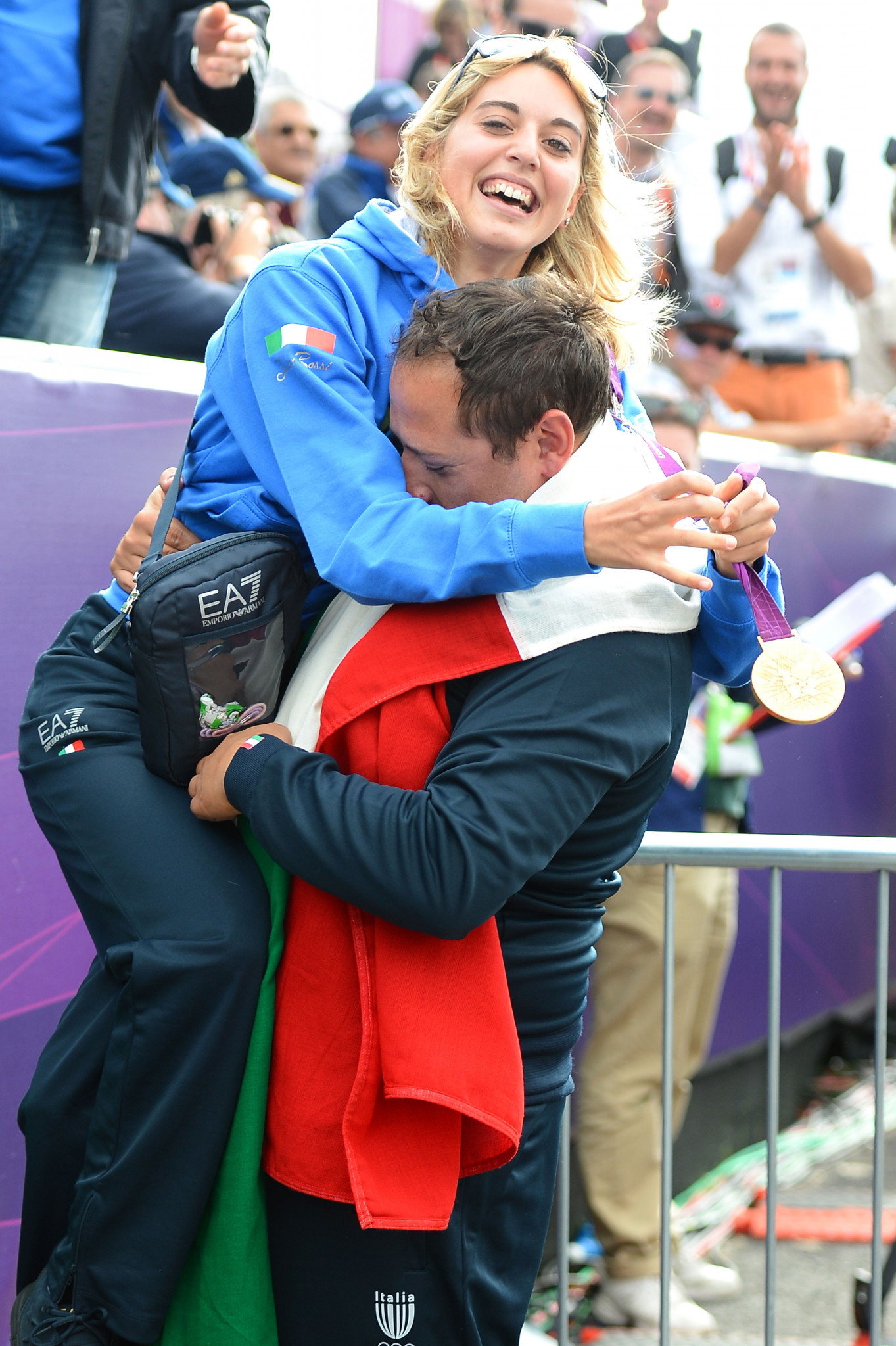 Italy's Jessica Rossi, pictured celebrating victory at London 2012, is well placed ahead of tomorrow's women's trap final in the ISSF Shotgun World Cup in the United Arab Emirates ©Getty Images