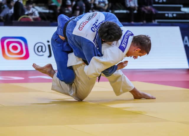 Mikail Ozerler, right, earns gold for the host nation on the last night of the IJF Grand Prix in Antalya ©IJF