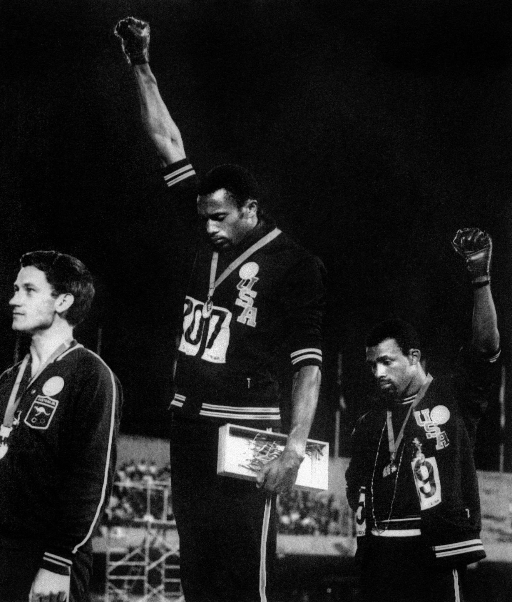 The podium protest after the Mexico City Olympics men's 200 metres by gold medallist Tommie Smith and bronze medallist John Carlos saw team-mates including Wyomia Tyus defy the authorities to show their support ©Getty Images