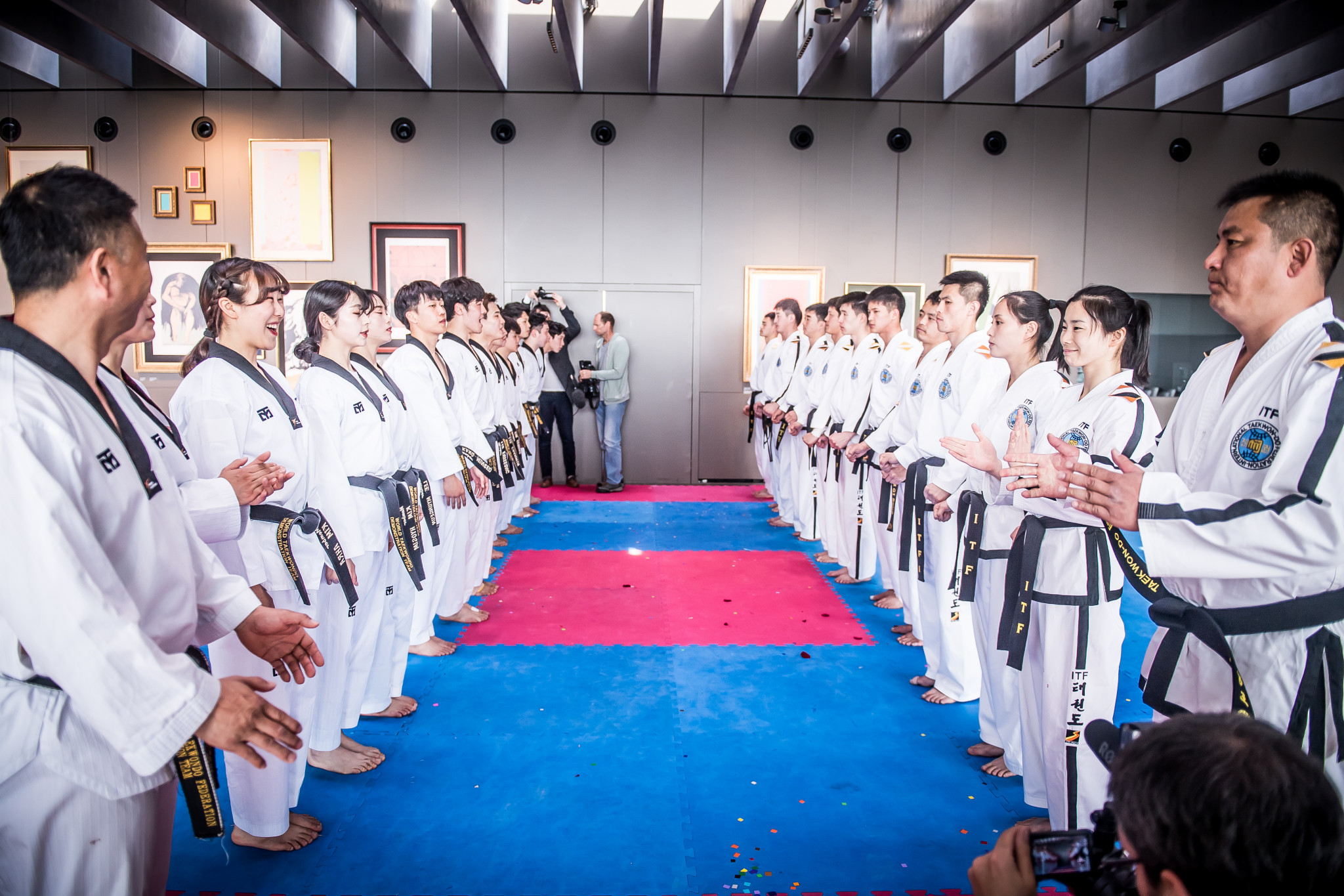 The two teams came together in a joint display after they had finished their individual performances ©World Taekwondo
