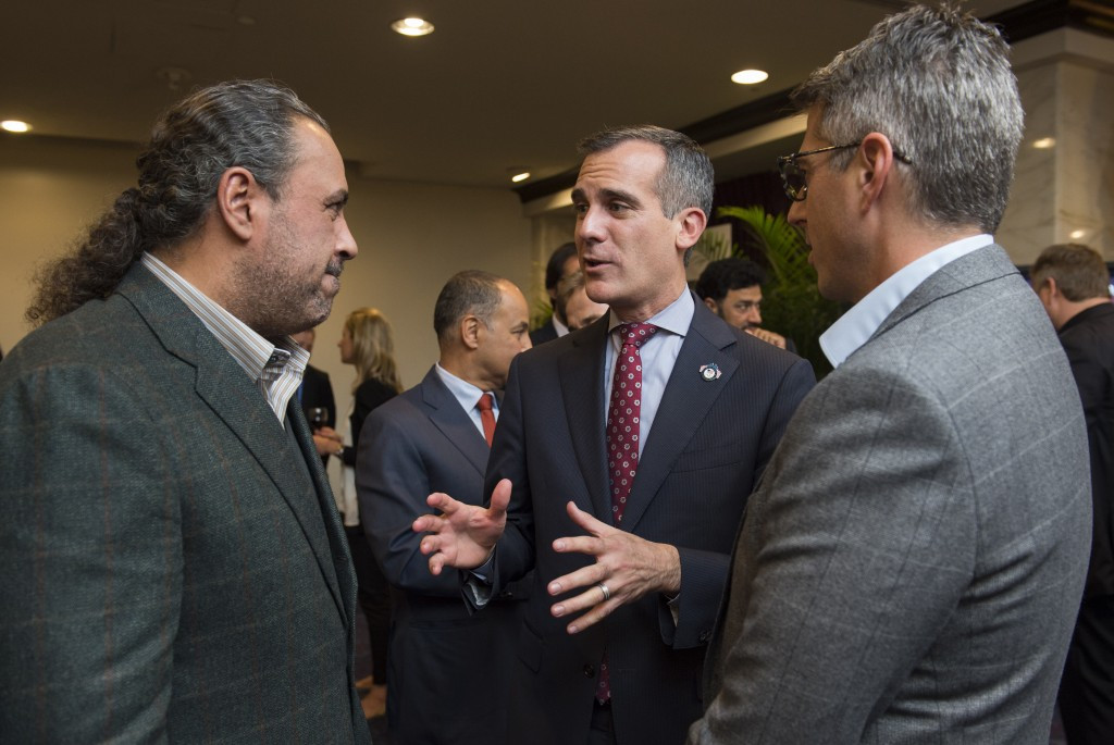 Los Angeles Mayor Eric Garcetti (centre) talking to IOC member and ANOC President Sheikh Ahmad Al-Fahad Al-Sabah during the General Assembly ©Getty Images