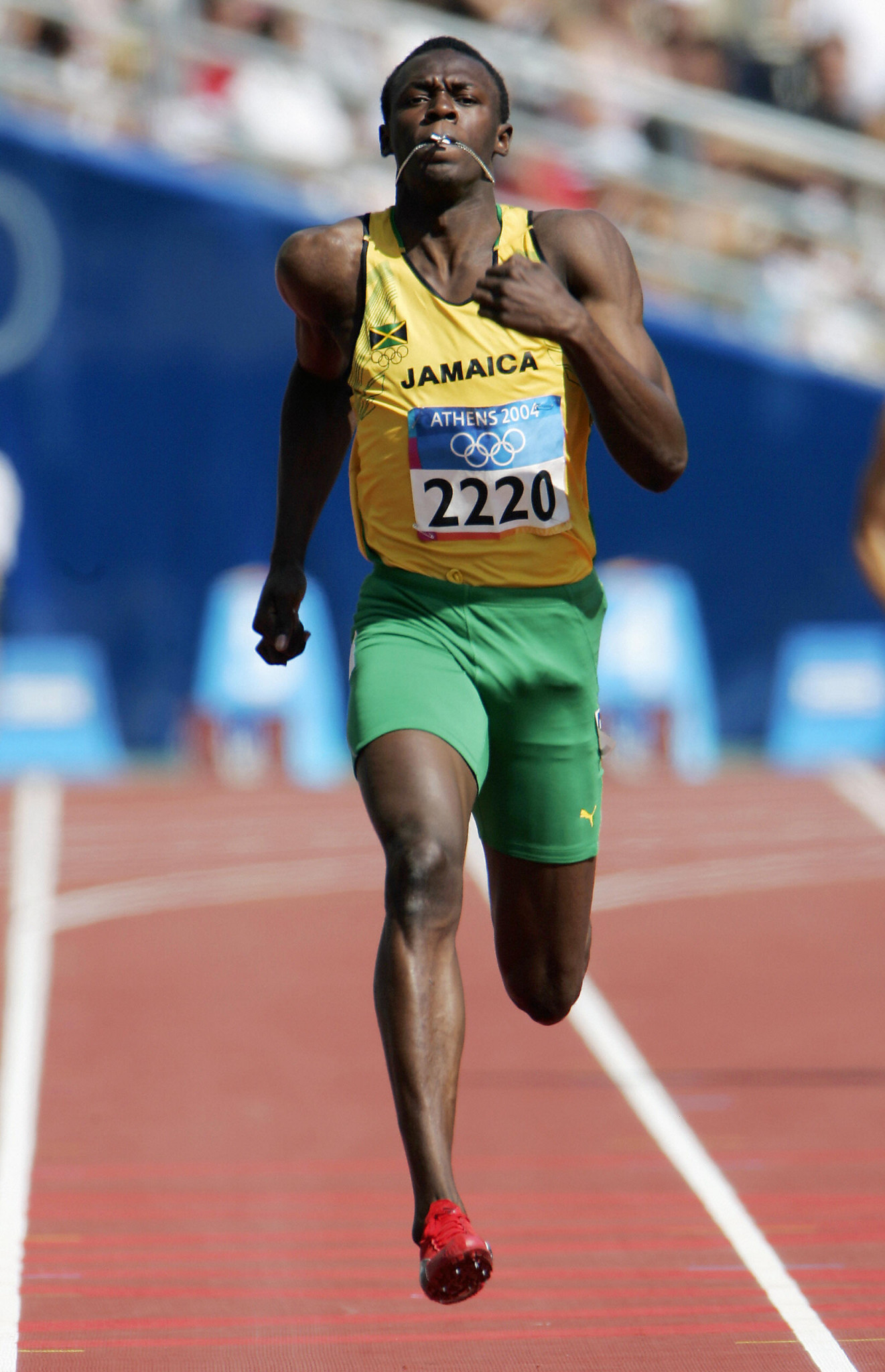 Usain Bolt competing at the Athens Olympics in 2004, the year he won a second Austin Sealy Award at the CARIFTA Games for becoming the first under-20 athlete to better 20sec for the 200m, running 19.93sec ©Getty Images