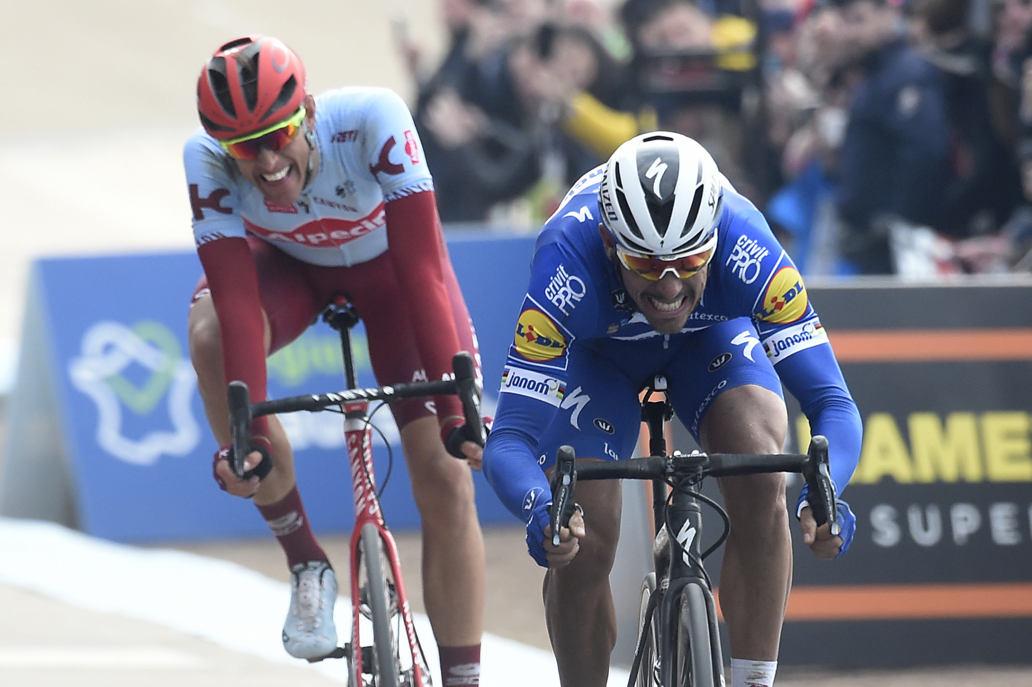 Gilbert out sprints Politt to win Paris-Roubaix for first time