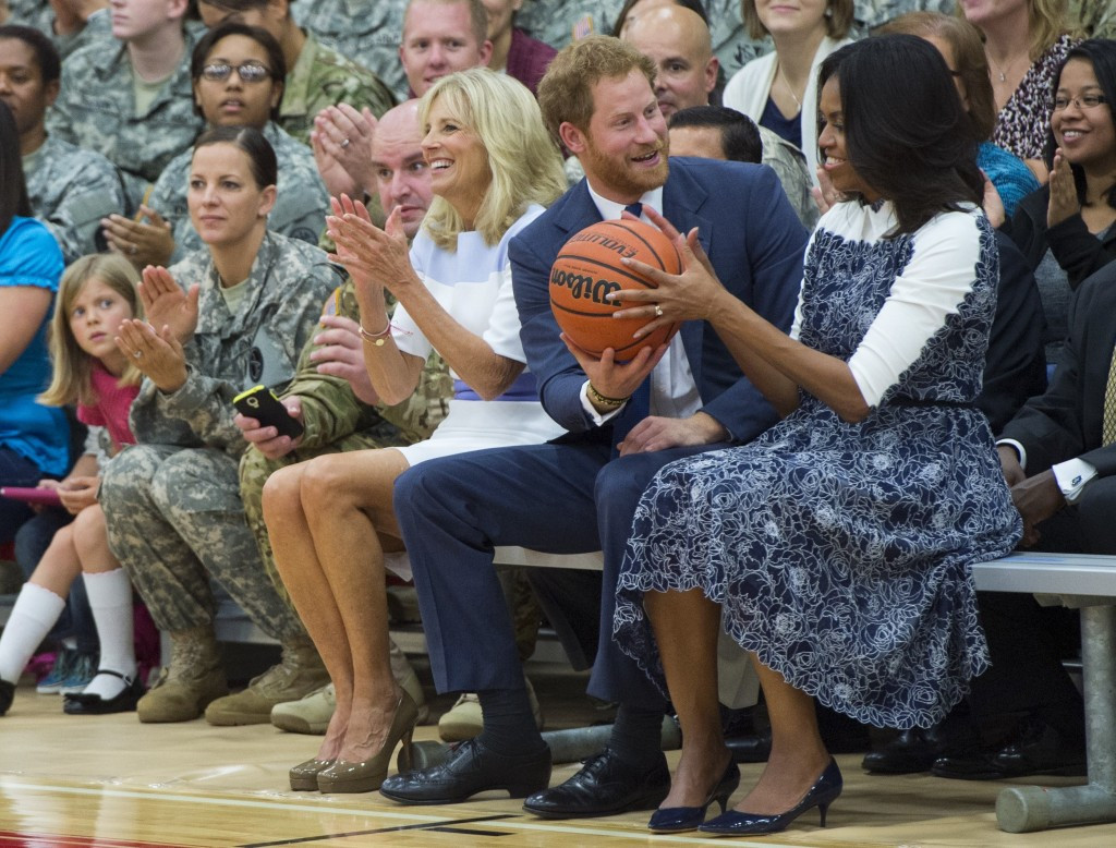 Prince Harry, Michelle Obama and Jill Biden watched a wheelchair basketball match during the visit