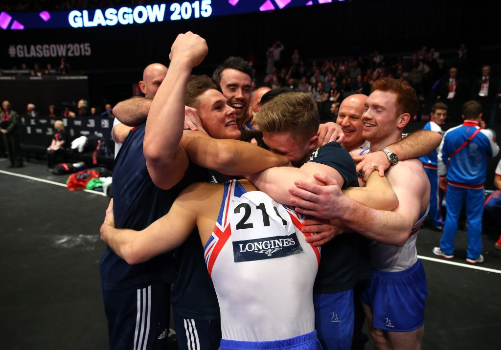 Max Whitlock of Britain was mobbed following confirmation of their silver medal ©Getty Images