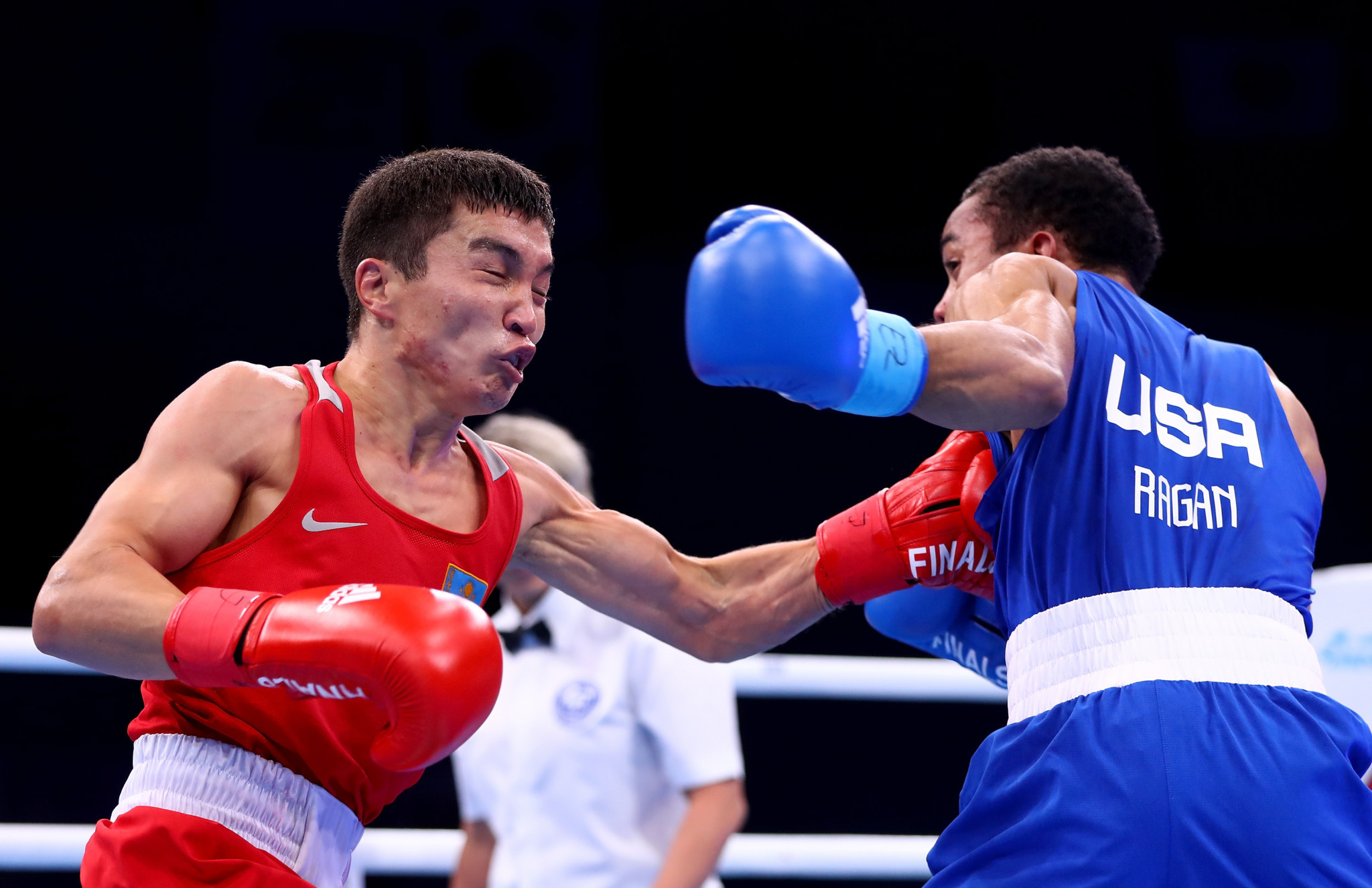 Reigning world champion Kairat Yeraliyev of Kazakhstan, left, was among the other casualties on day four ©Getty Images