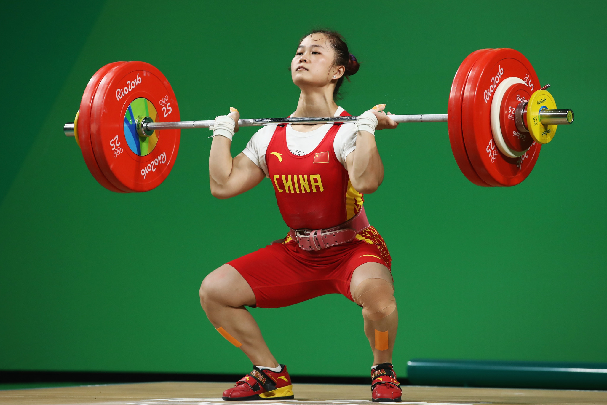 China’s Deng Wei broke her world records in the snatch, clean and jerk and total to cruise to victory in the women’s 64 kilograms category at the Asian Weightlifting Championships in Ningbo in China today ©Getty Images