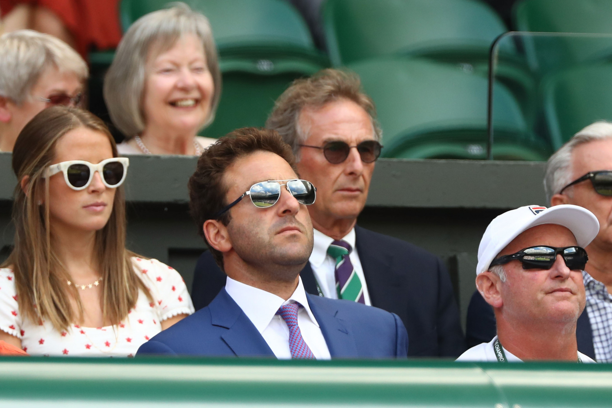 Justin Gimelstob, pictured centre, front at Wimbledon last year, faces an uncertain future in tennis following his guilty plea to what a Los Angeles judge called a "violent, unprovoked attack" ©Getty Images