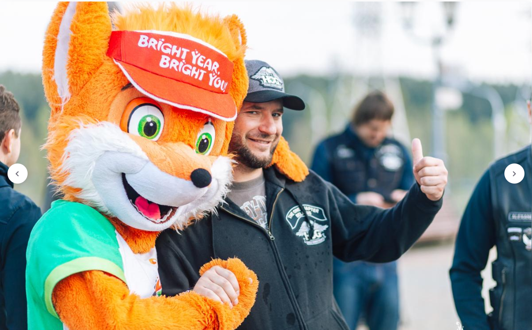 Minsk 2019 mascot Lesik the fox meets a biker from The One Chapter Belarus ©Minsk 2019