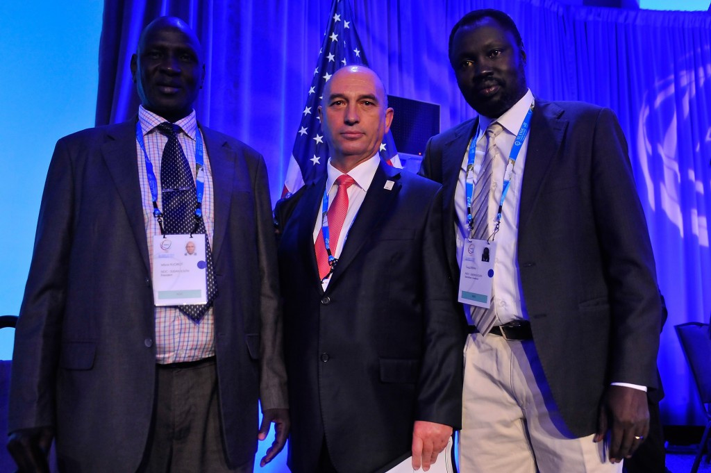 KOC President Besim Hasani, pictured (centre) following Kosovo and South Sudan's recognition by ANOC yesterday ©Getty Images