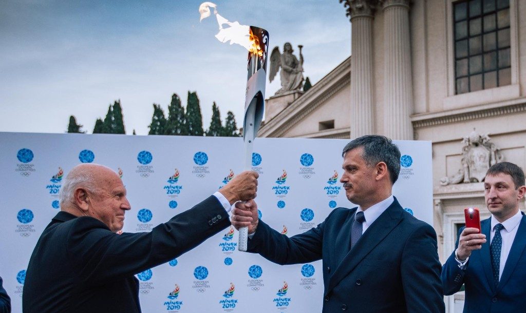 Kocijančič handed the Flame of Minsk 2019 to Kovalchuk ©Minsk 2019