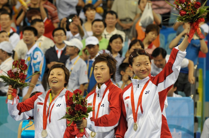 Singapore's Wang Yuegu (left), Feng Tianwei (centre) and Li Jiawei (right) won the women's team silver medal at the Beijing 2008 Olympic Games
