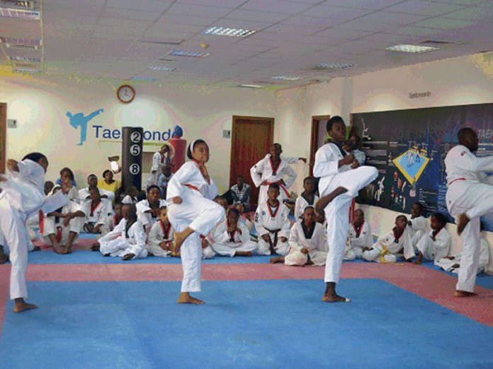 Participants in the under eight beginners, under eight coloured belt and over eight coloured belt categories graduated from the Korean Cultural Centre taekwondo ©Korean Cultural Centre 