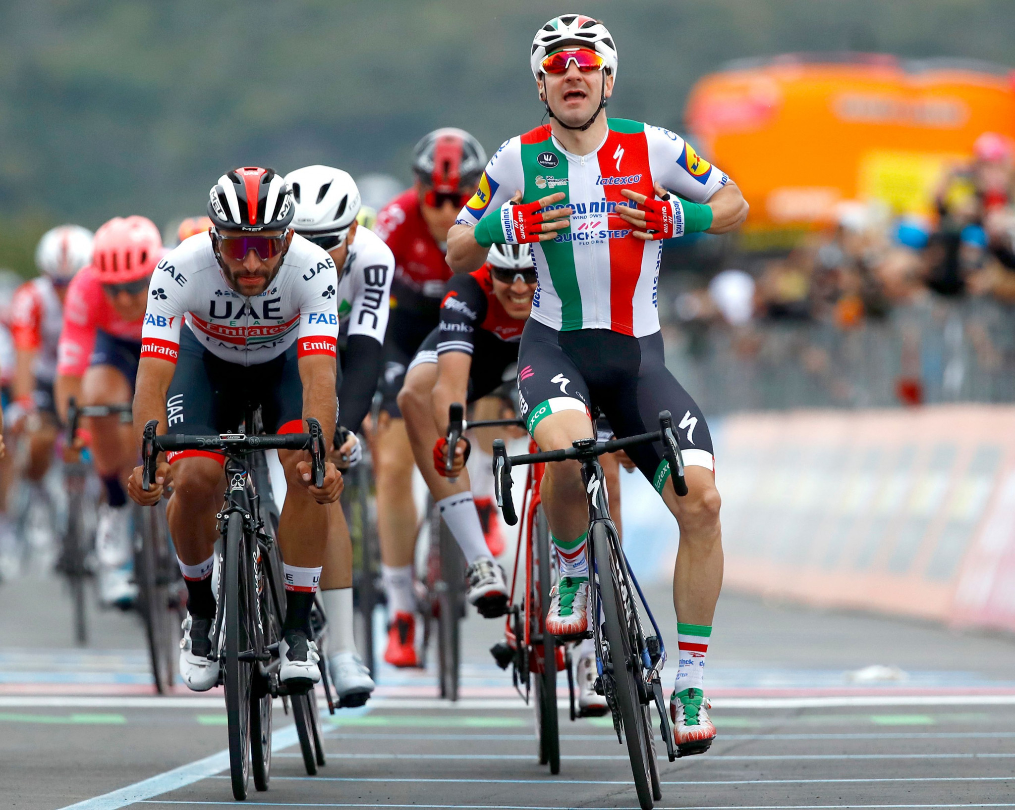 Home favourite Elia Viviani crossed the line first but was disqualified for dangerous riding ©Getty Images