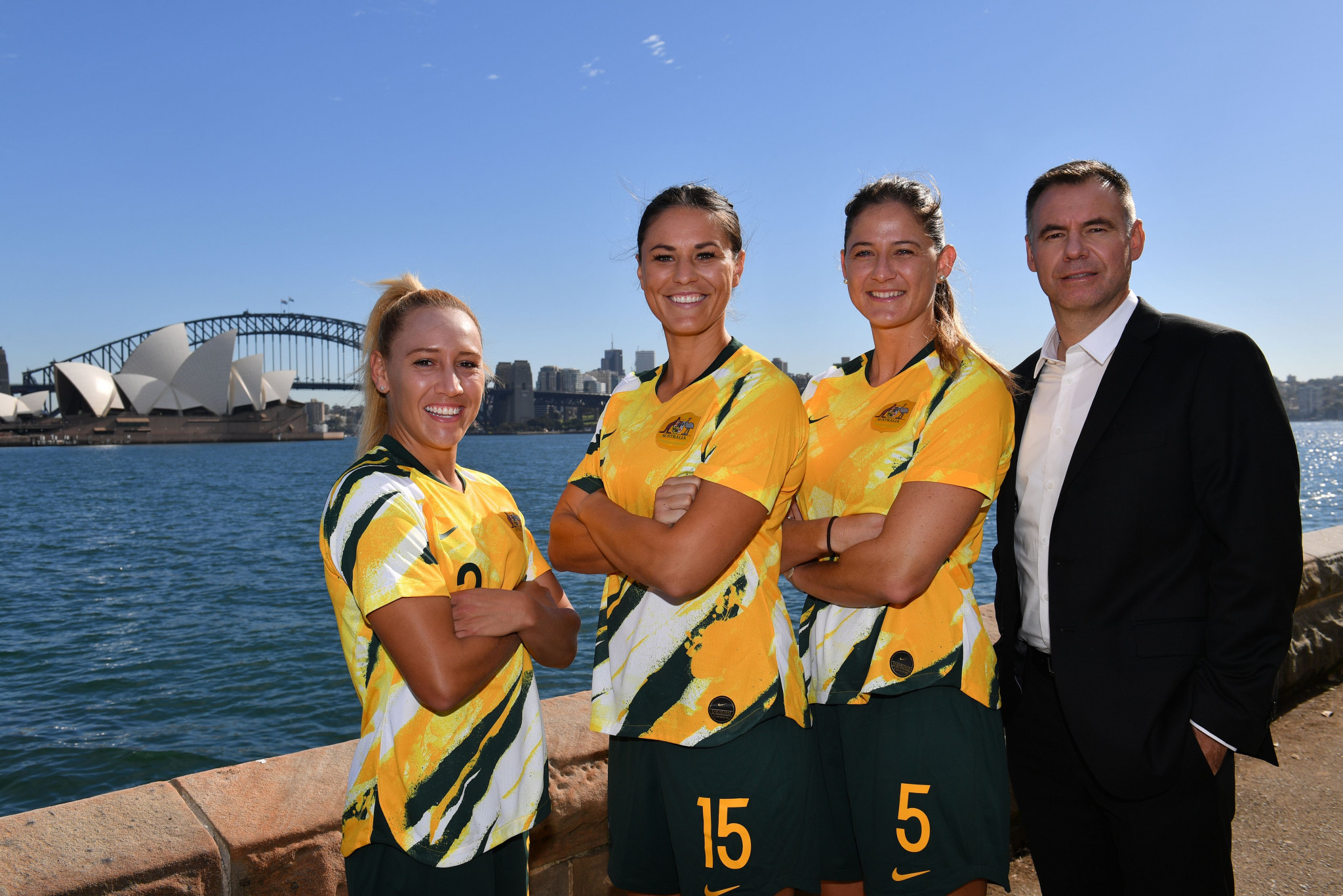 Ante Milicic, pictured with three of his Australian players, has been confirmed as head coach for the Tokyo 2020 campaign ©Getty Images