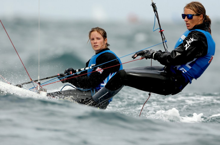 Great Britain's Hannah Mills and Saskia Clark finished third in the women's 470 medal race to ensure top honours