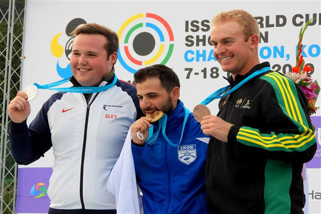 Andreas Makri of Cyprus won his first Shotgun World Cup gold after beating Britain's Matthew Coward-Holley, left, in a shoot-out in the men's trap final ©ISSF