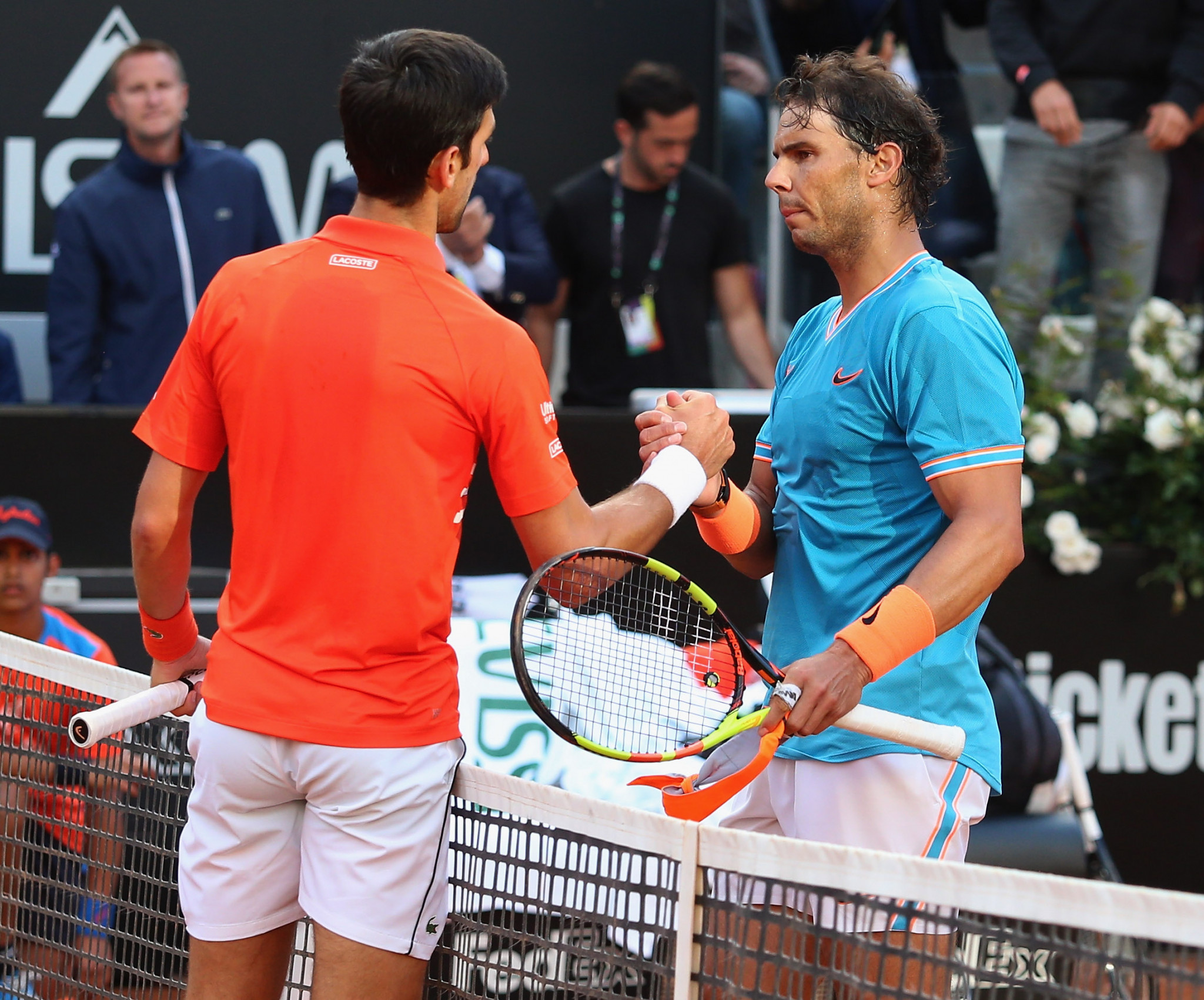 Old rivals Novak Djokovic and Rafael Nadal shake hands ©Getty Images
