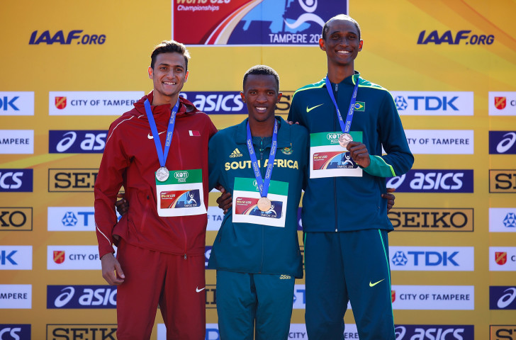 Brazil's Alison Santos, pictured right, with his bronze medal from last year's 400m hurdles at the IAAF World under-20 Championships in Finland, won the South American title in Lima today ©Getty Images
