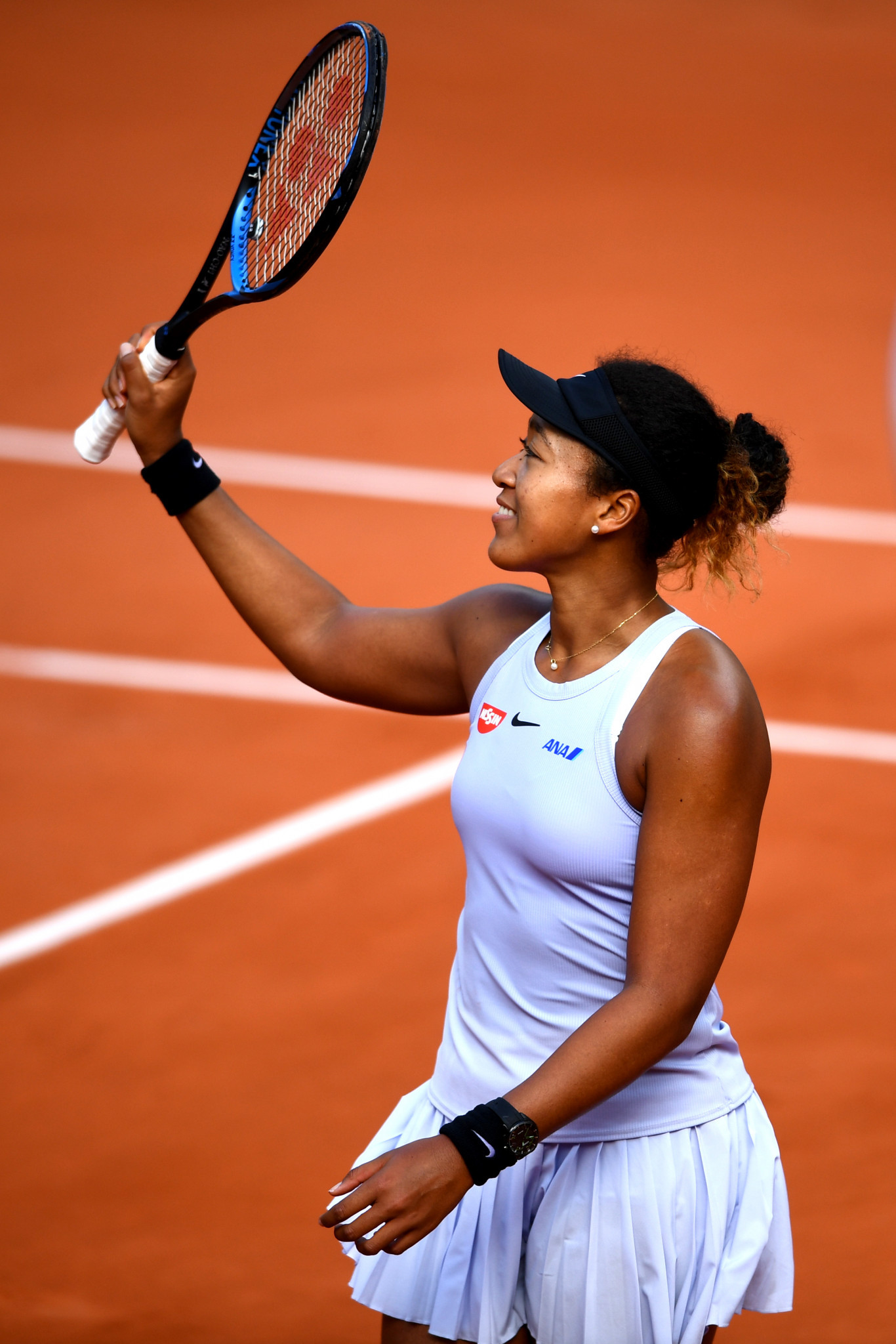 Osaka and Halep dig deep to progress at French Open