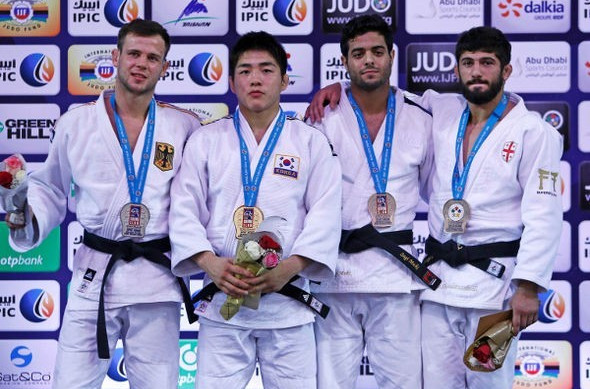 Israel's Sagi Muki (centre, right) claimed bronze in the men's under 73kg category at the IJF Judo Grand Slam in Abu Dhabi