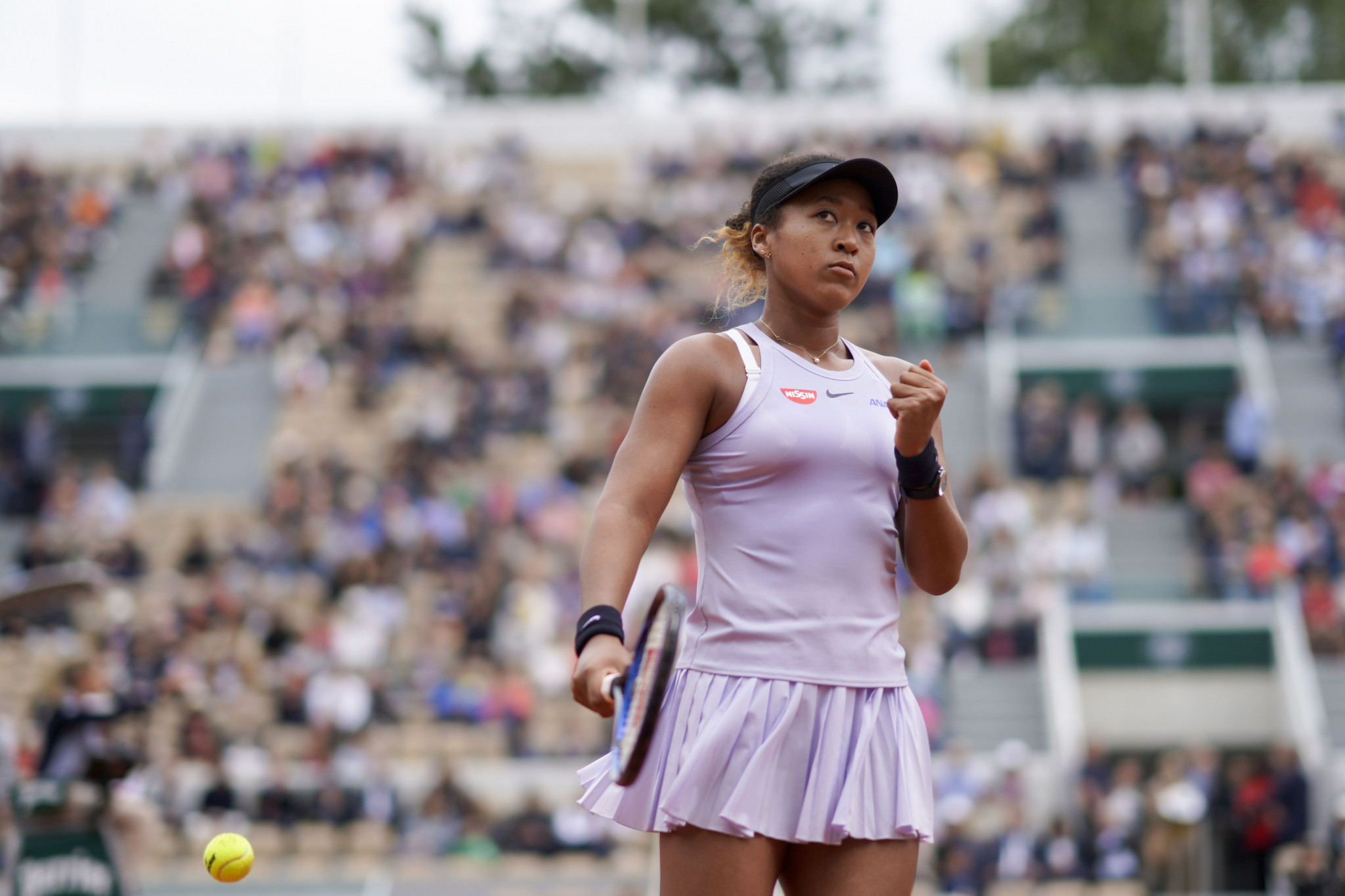 Japan's Naomi Osaka is seeking a third consecutive Grand Slam title but had to battle her way back against Victoria Azarenka of Belarus to reach the third round of the French Open ©Getty Images