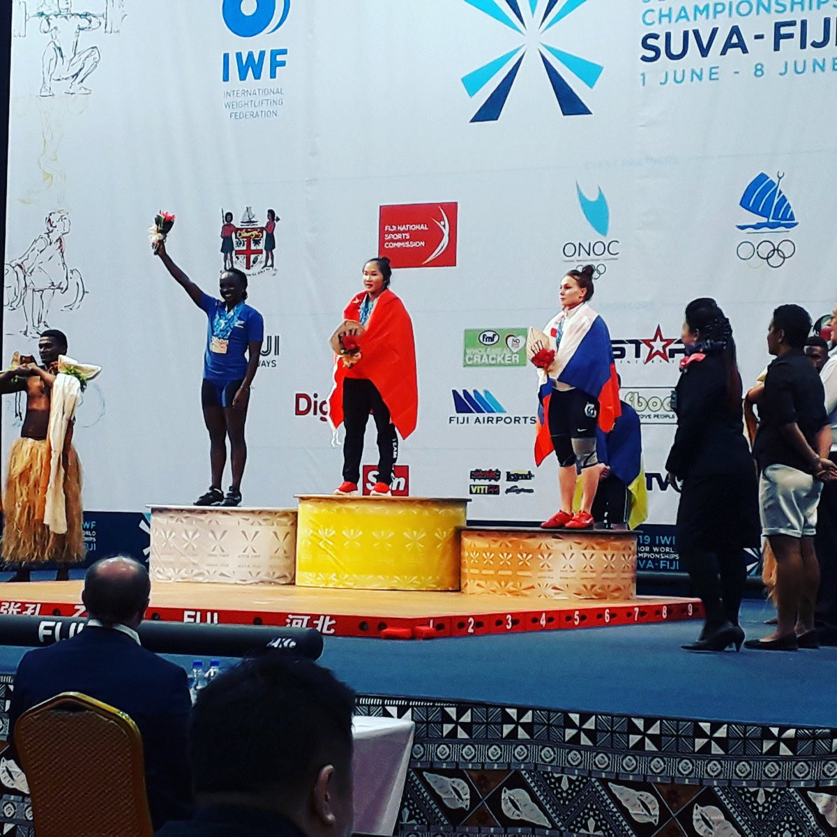 China's Gan Hongyan celebrates her victory in the 55kg category as its women's team maintained its 100 per cent success record at the IWF Junior World Championships in Suva ©Twitter