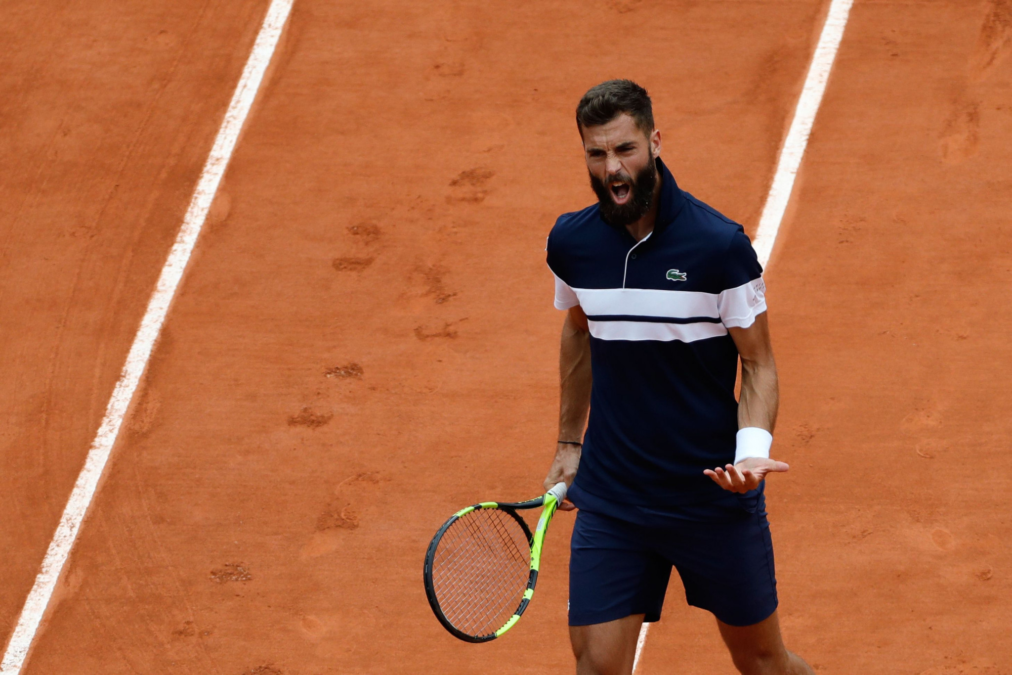 Benoit Paire shows his frustration on his way to a five-set defeat to Kei Nishikori ©Getty Images