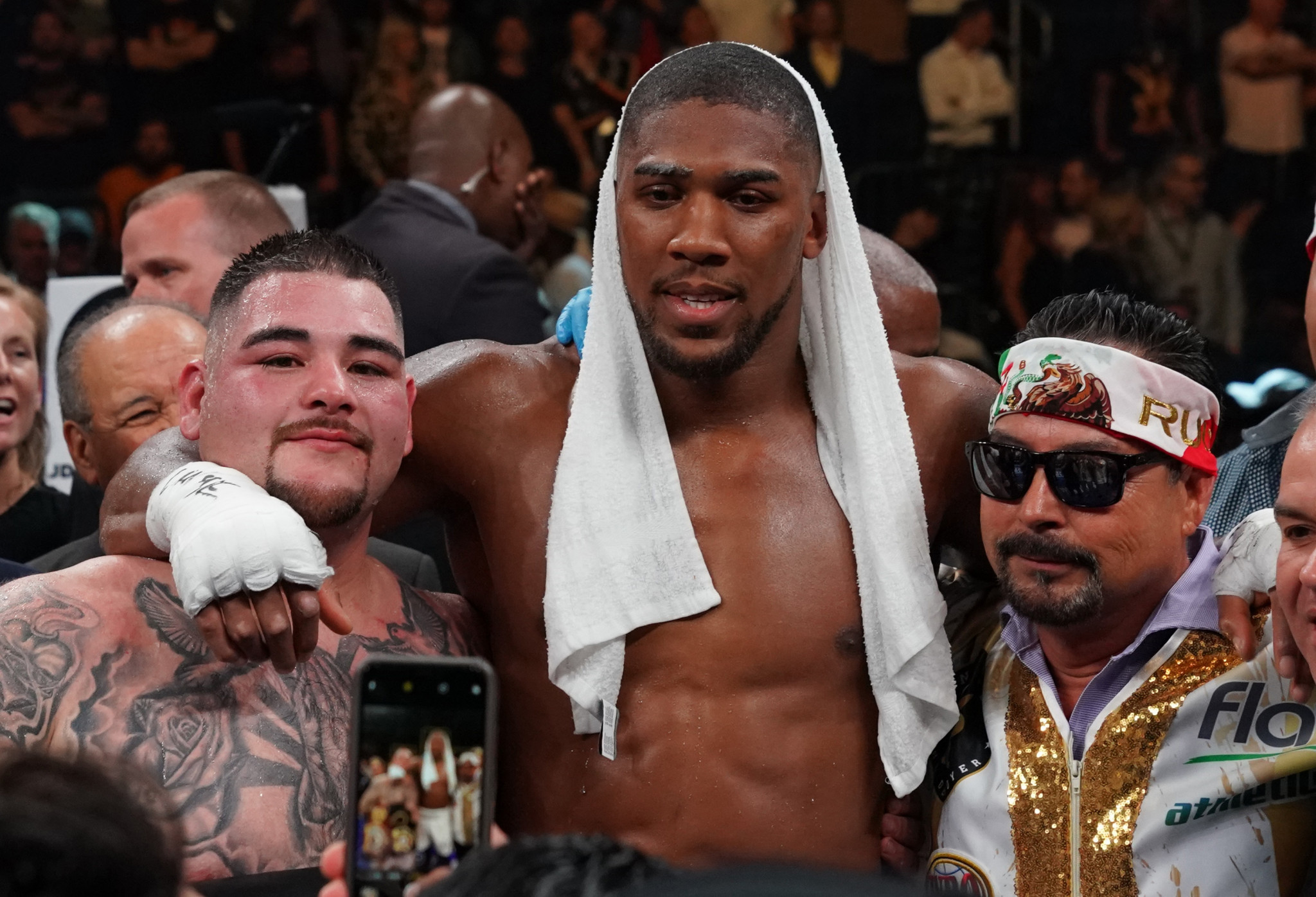 Rather than appearing upset by his shock defeat, Anthony Joshua happily posed with pictures with the man who beat him - Mexico's unfancied Andy Ruiz jnr ©Getty Images