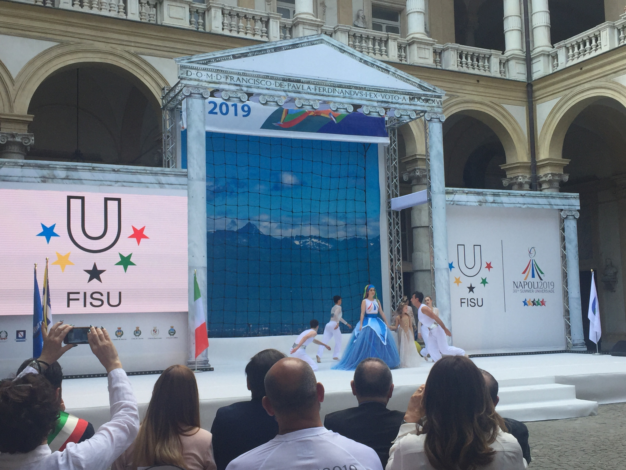 During the Torch Lighting ceremony at the University of Turin, a live performance depicted the Naples 2019 official mascot, a mermaid called Partenope ©ITG