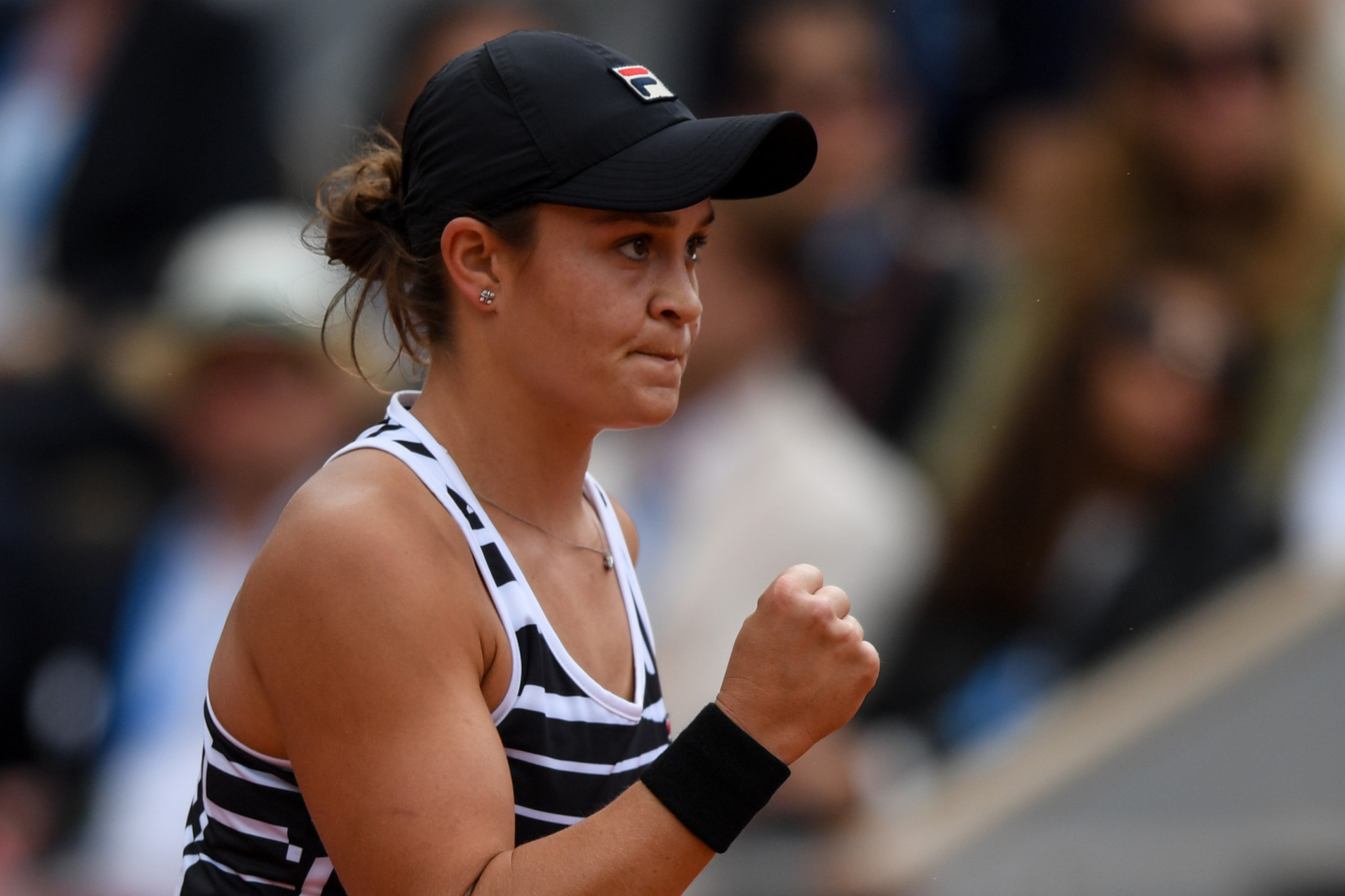 Eighth seed Barty pumps a fist after getting a crucial point in the women's French Open final ©Getty Images