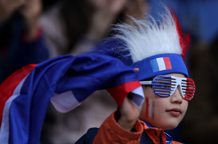 A young home fan watches Friday's opening match in the FIFA Women's World Cup 2019 between hosts France and South Korea ©Getty Images