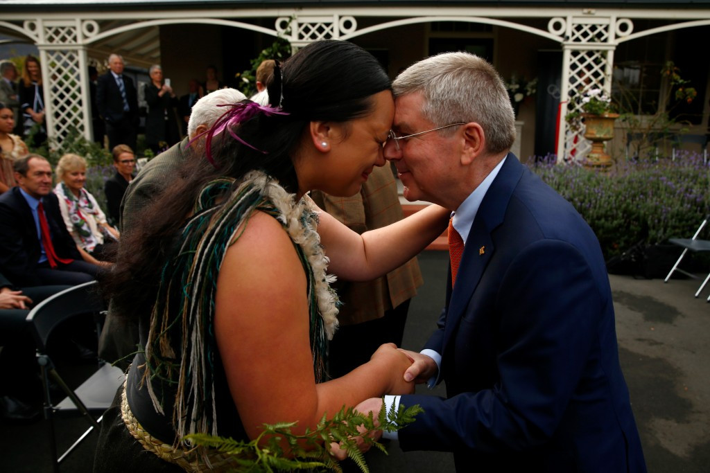 Thomas Bach engaging in a typical Maori greeting before opening Olympic House ©Getty Images