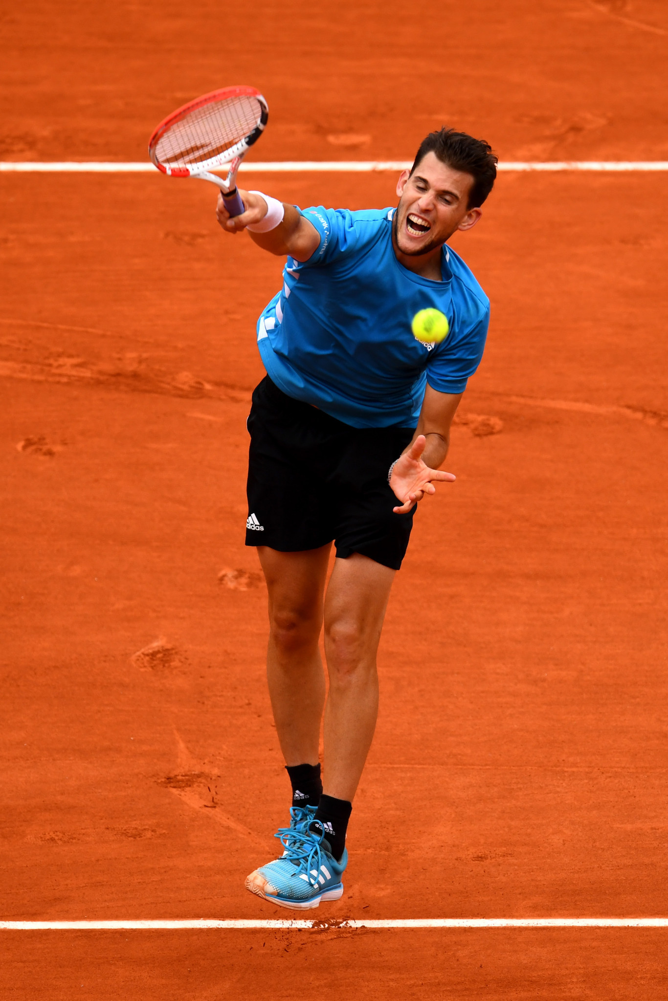 Dominic Thiem thunders down a smash during the French Open final ©Getty Images
