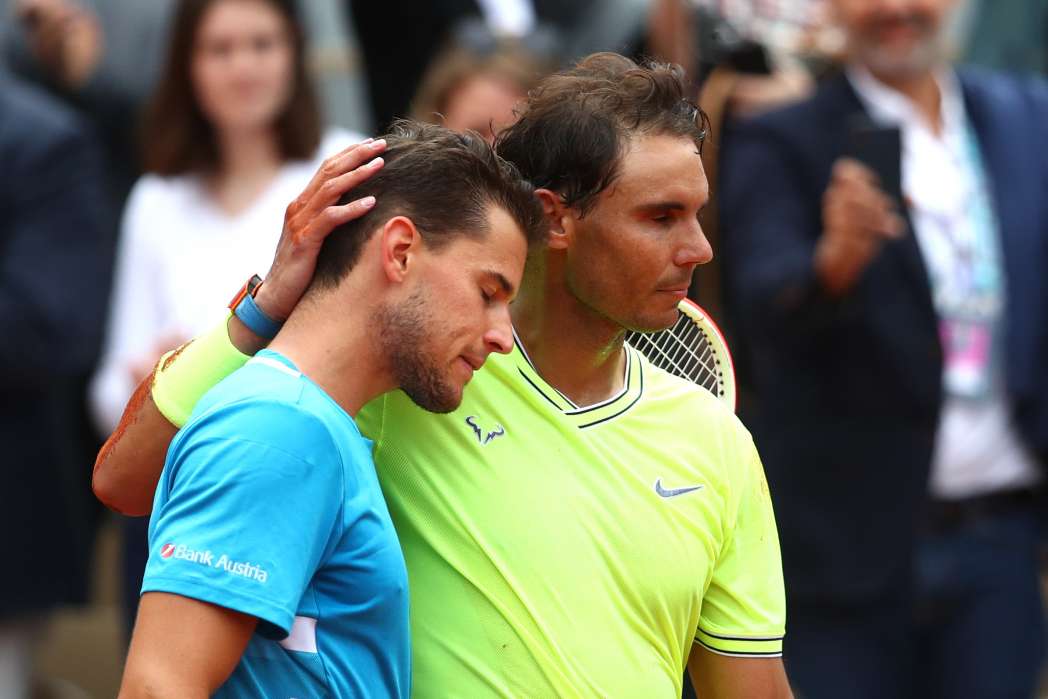 Spain's Rafael Nadal consoles Dominic Thiem after defeating the Austrian in the French Open Final for a second successive year to claim a record 12th title at the event ©Getty Images