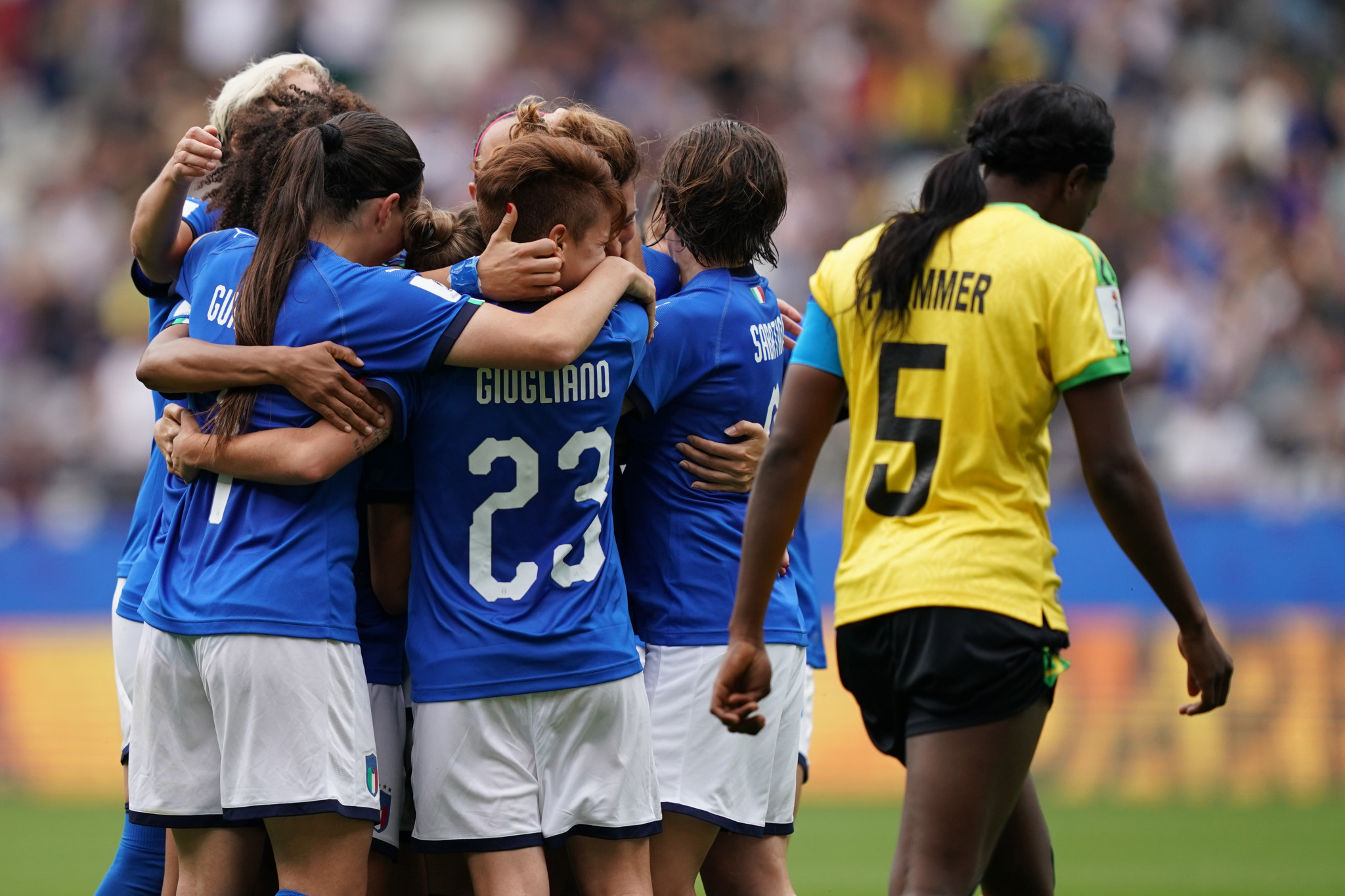 Cristiana Girelli is mobbed by her team mates after putting Italy 3-0 up against Jamaica ©Getty Images