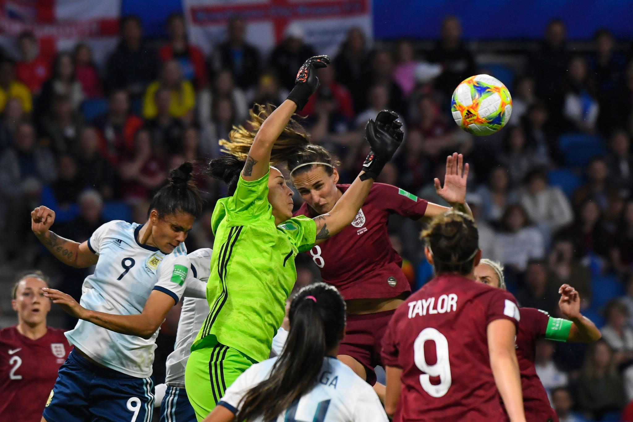 Argentina goalkeeper Vanina Correa, centre, cuts out a cross in a Group D match against England ©Getty Images