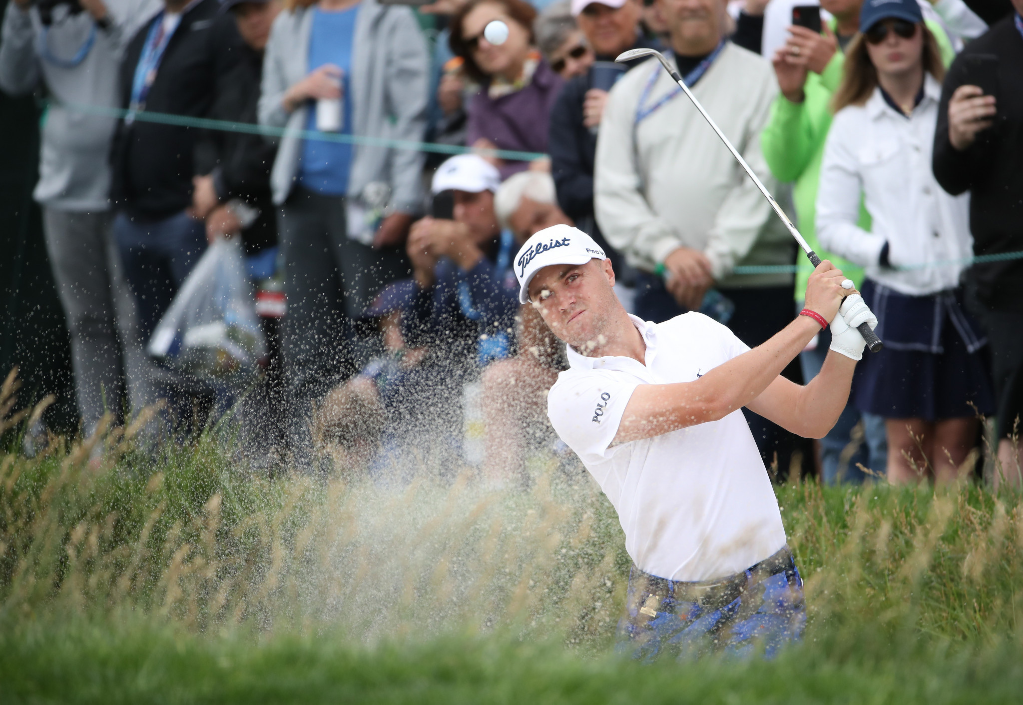 Justin Thomas of the United States plays a bunker shot at Pebble Beach Golf Links ©Getty Images