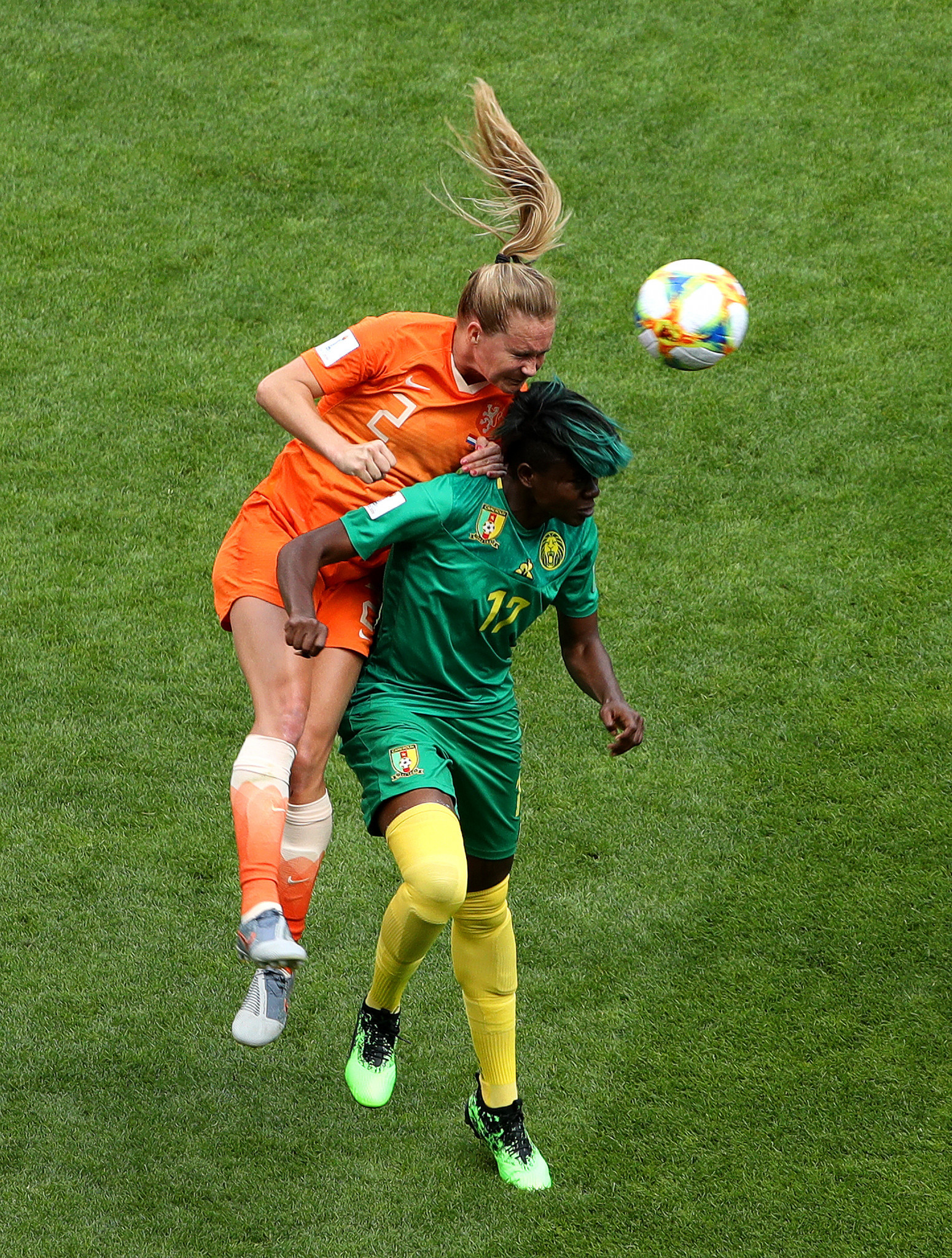 Desiree van Lunteren of the Netherlands competes for a header with Cameroon's Gaelle Enganamouit ©Getty Images