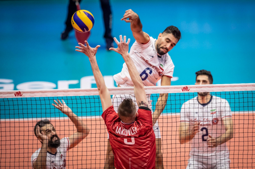 Iran maintained their place at the summit of the Nations League with a straight sets win over Russia © FIVB