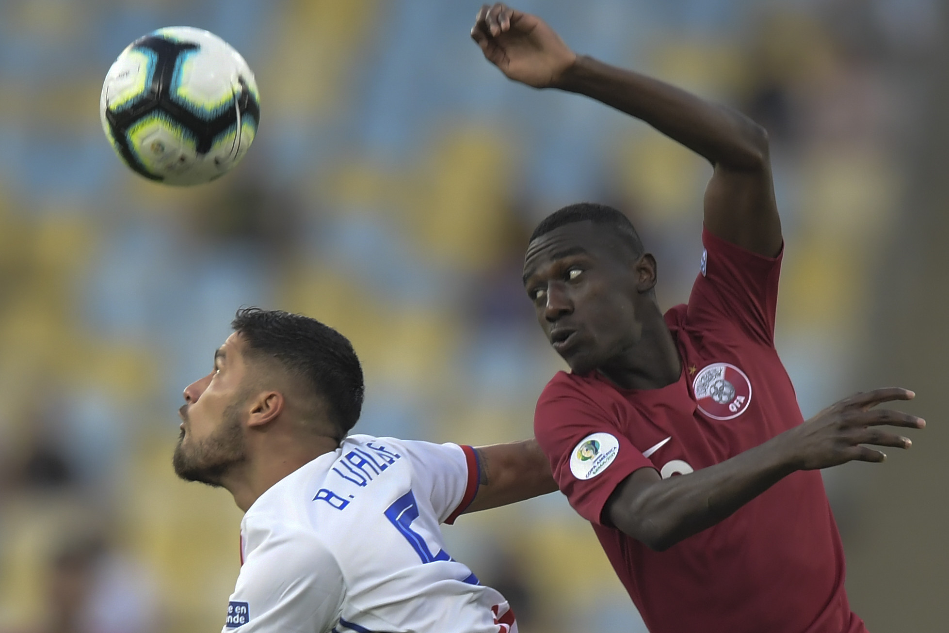 Paraguay's Bruno Valdez, left, and Qatar's Almoez Ali vie for the ball during their opening Group B match at the 2019 Copa América ©Getty Images