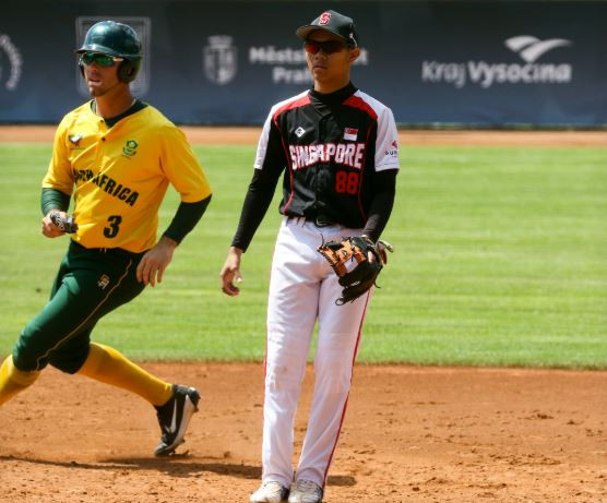 Singapore fought back to win their first World Baseball Softball Confederation Men's Softball World Championship win in 27 years against South Africa ©WBSC