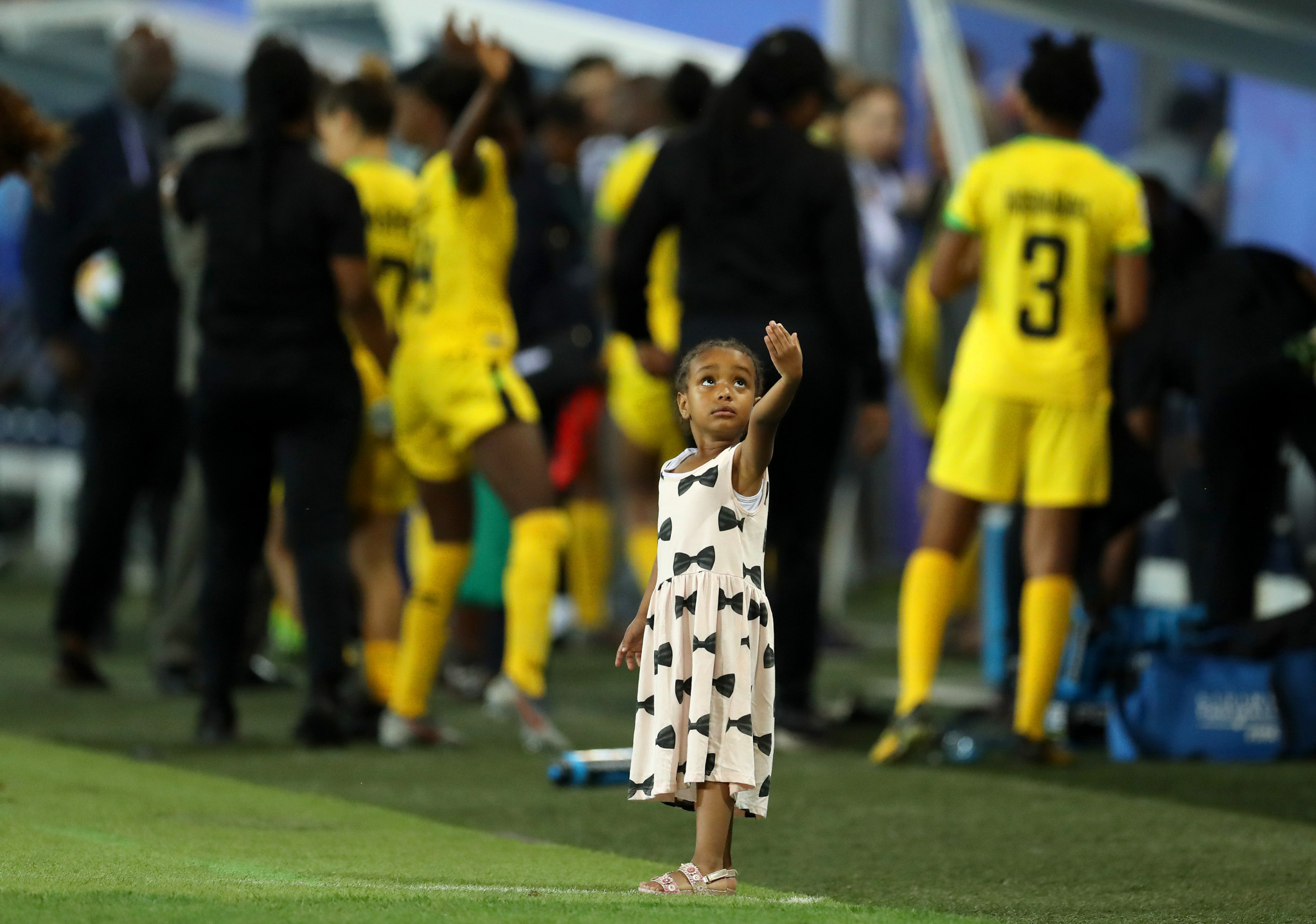 A child dances on the sidelines following Australia's victory over Jamaica ©Getty Images