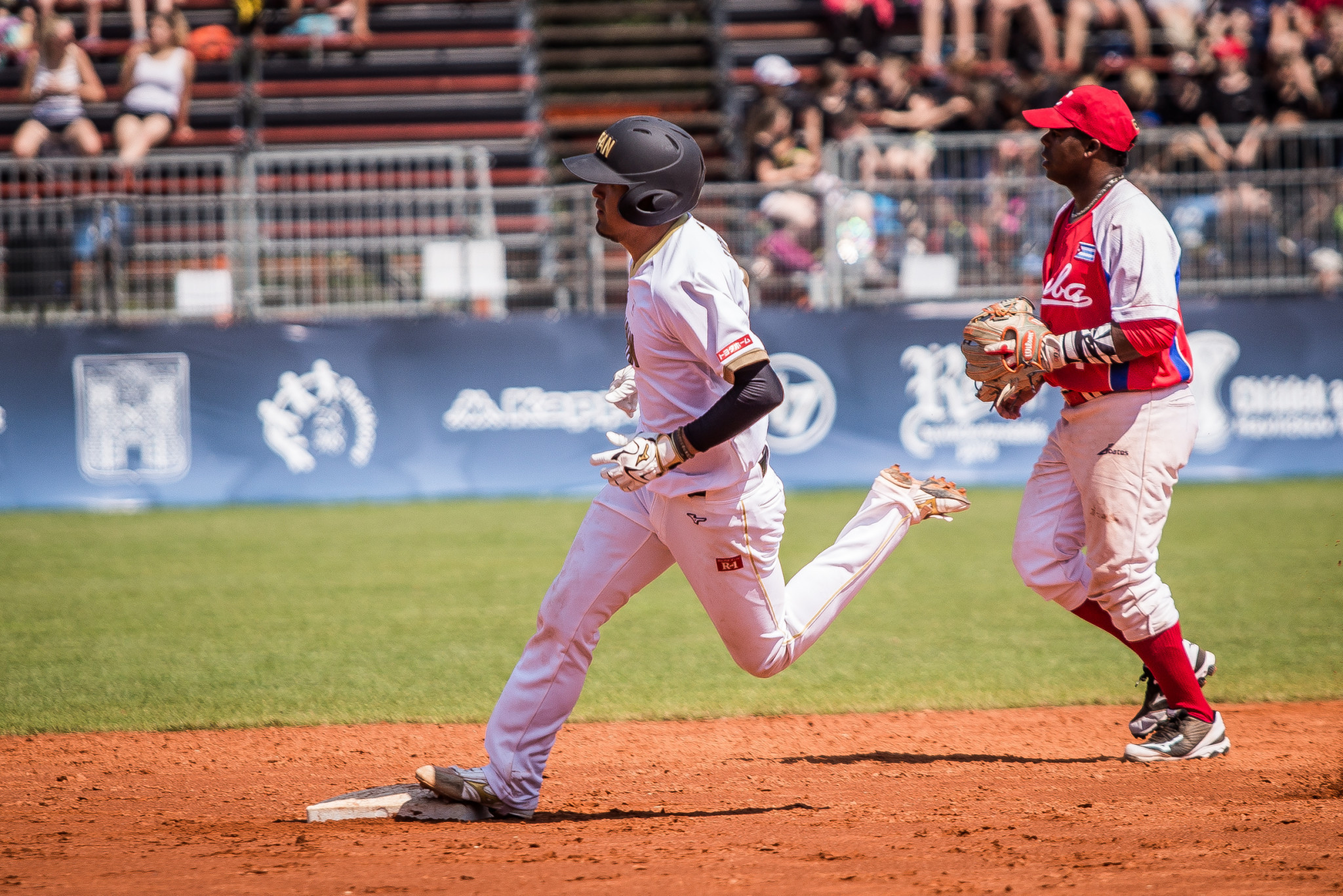 Japan secured first place in Group A with a 2-0 win over Cuba as action continued today at the WBSC Men's Softball World Championship in Czech Republic ©WBSC
